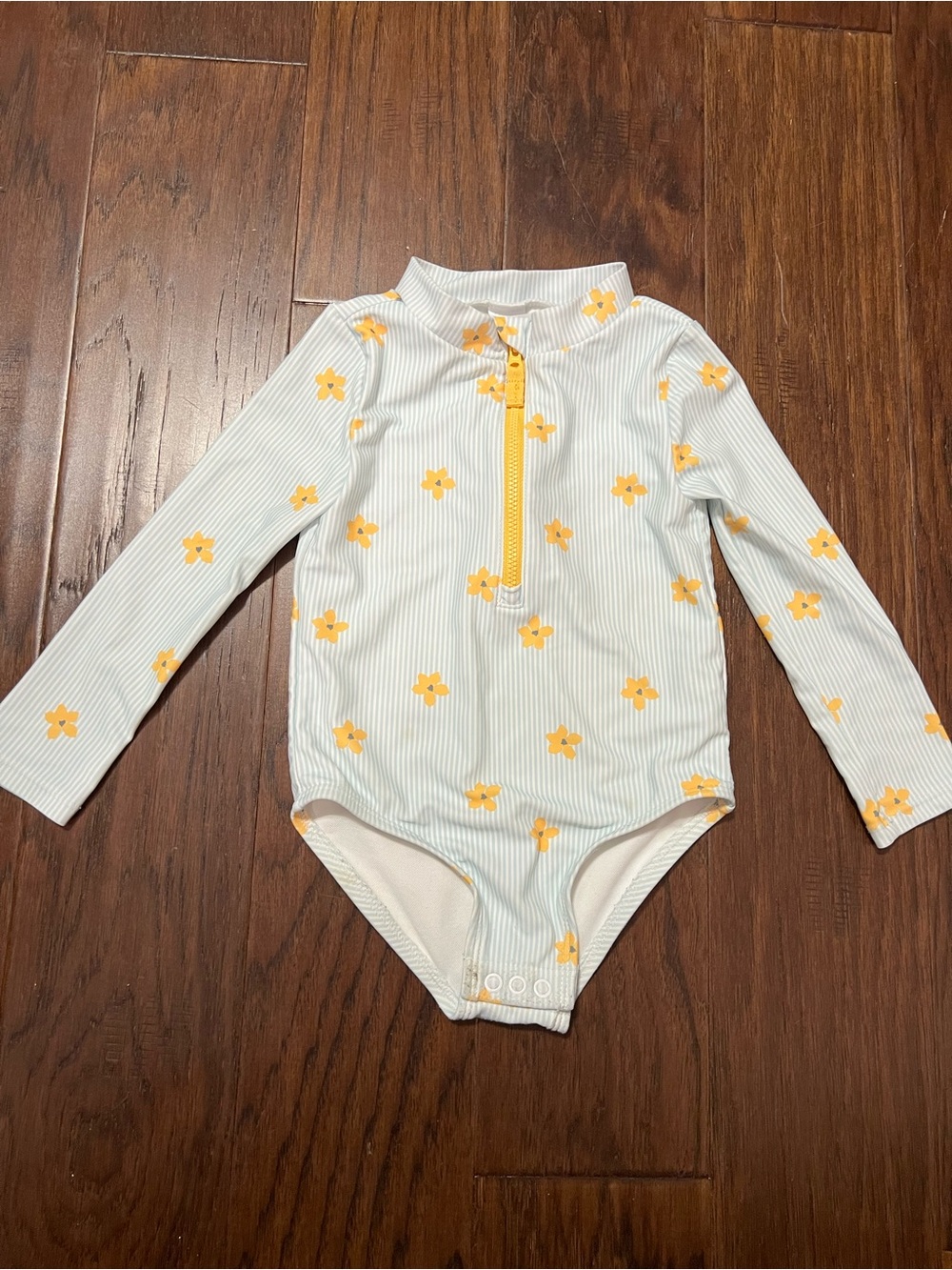 Carters Toddler One Piece Rashguard Light blue daisy print. Size 2T